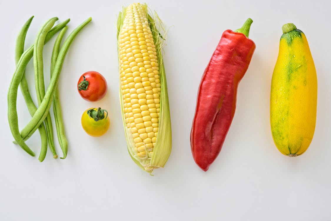 Free Five Assorted Vegetables on White Surface Stock Photo