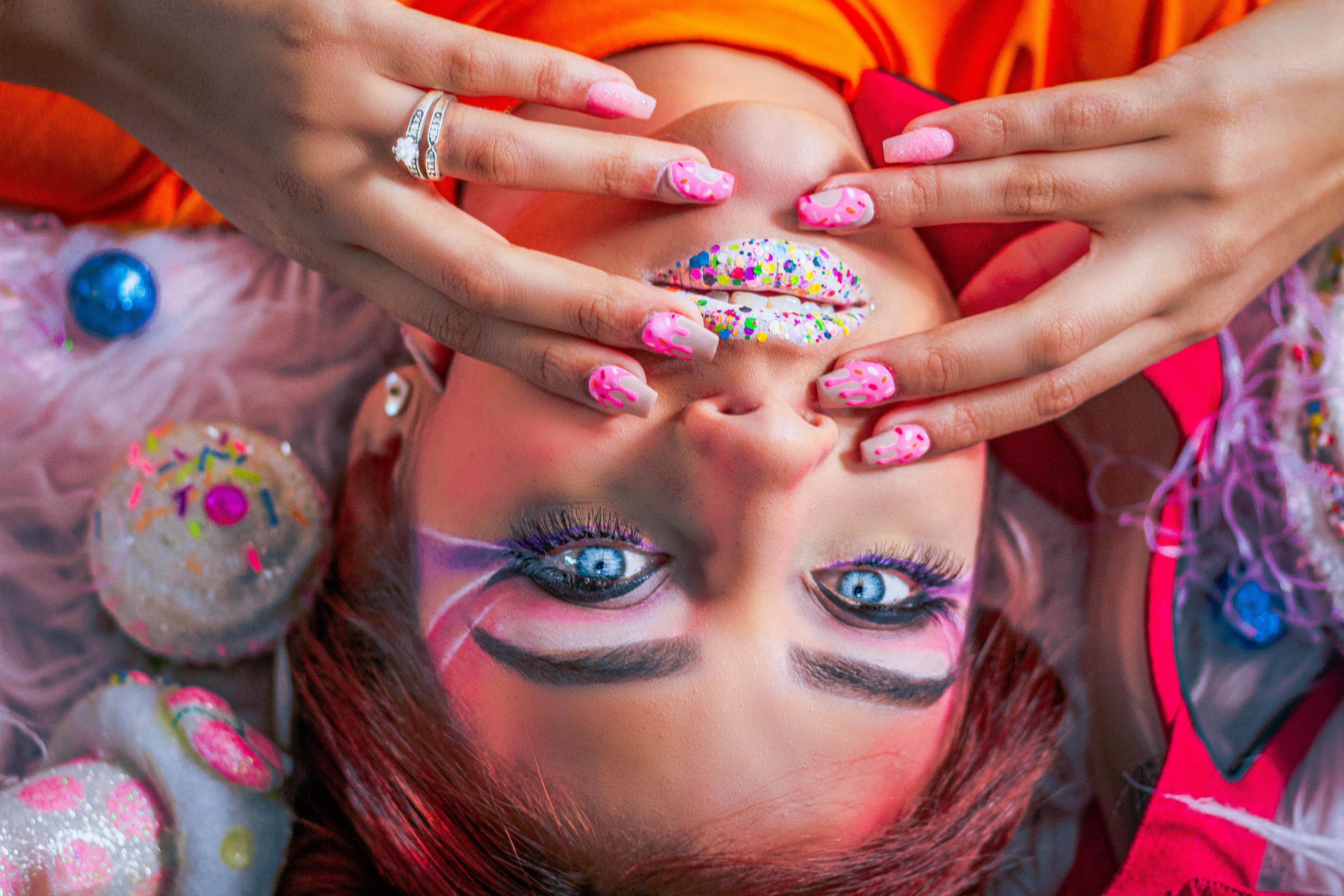 woman with blue and white manicure