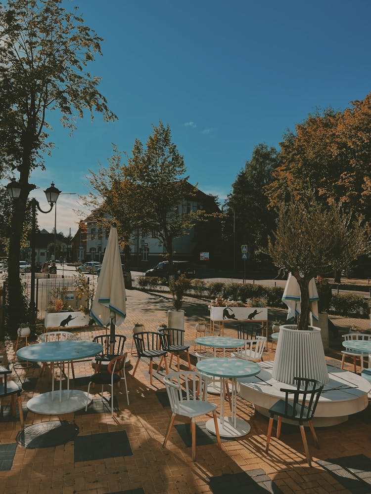 Tables And Chairs In Outdoor Restaurant