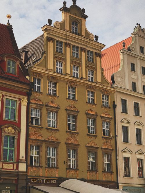 Free Explore the beautiful architectural detail of a historical building in Wrocław's Market Square. Stock Photo