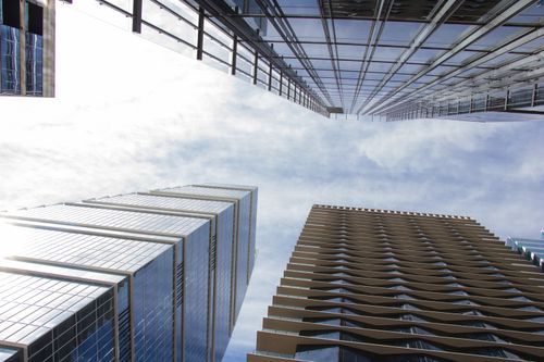 Free Low-angle view of high-rise buildings against a bright blue sky in Austin, Texas. Stock Photo