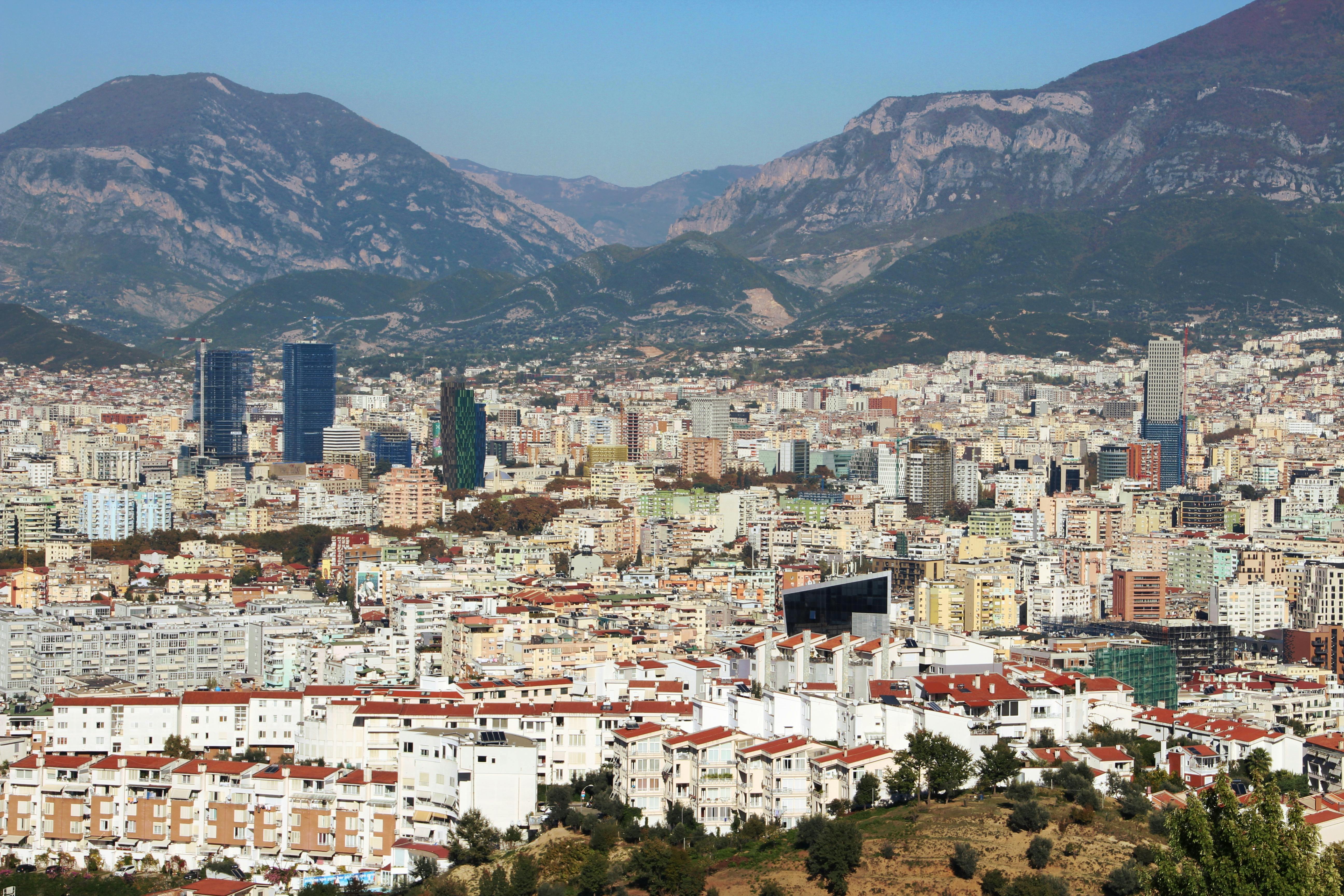 Best eSIM for Albania — aerial view of Tirana with mountains in the background