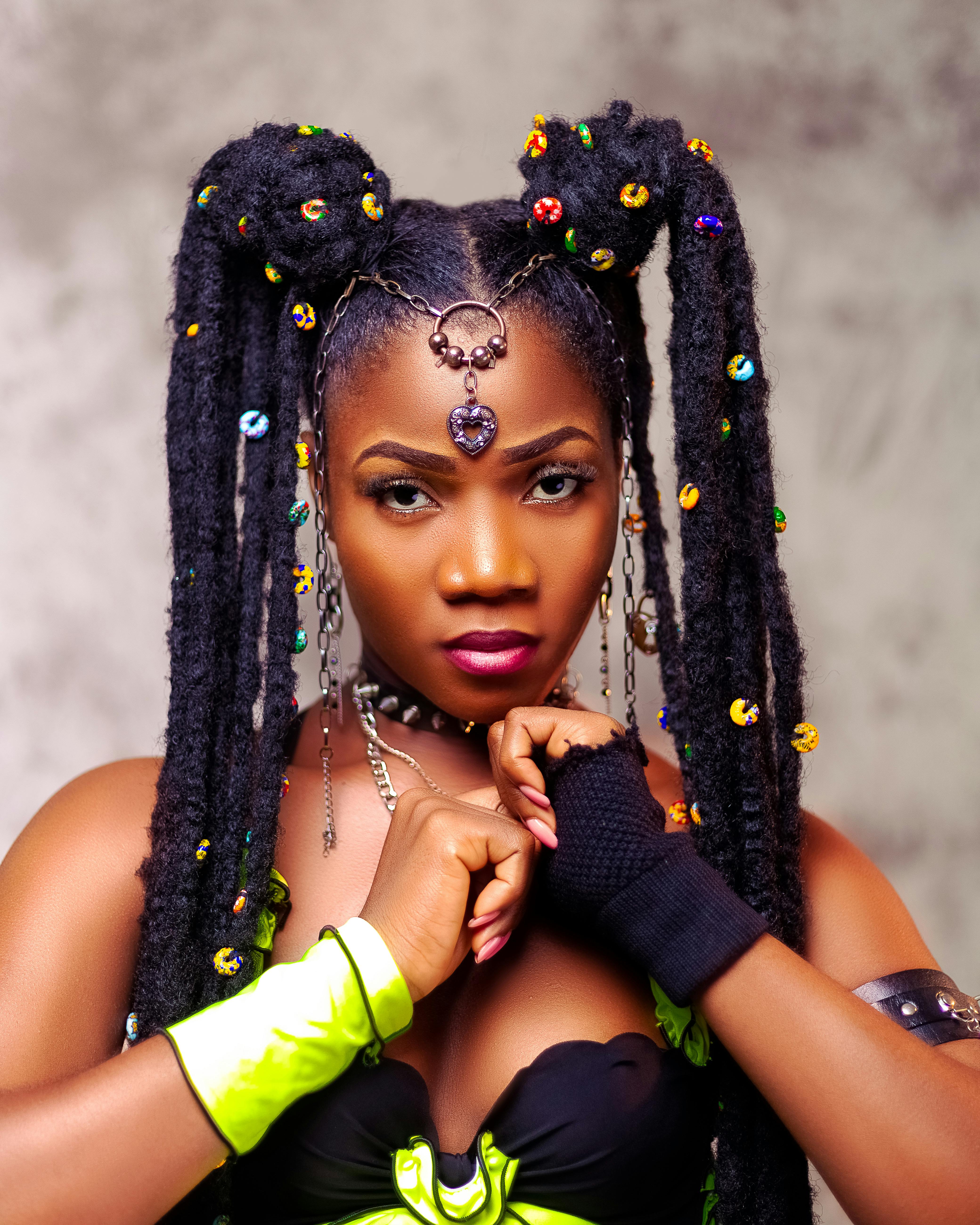 Woman in a Hairstyle with Beads · Free Stock Photo