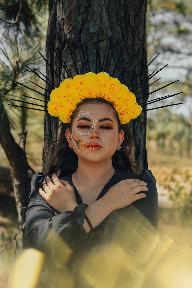 Portrait Of Woman Wearing Dia De Los Muertos Makeup