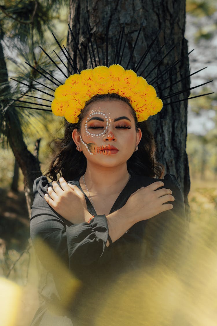 Portrait Of Woman Wearing Dia De Los Muertos Makeup