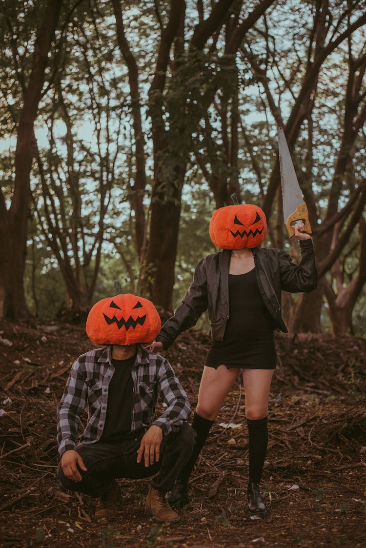 Couple Wearing Pumpkin Masks