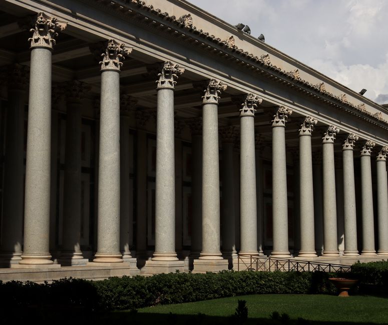 Sophisticated architectural design featuring a classical colonnade and ornate columns.