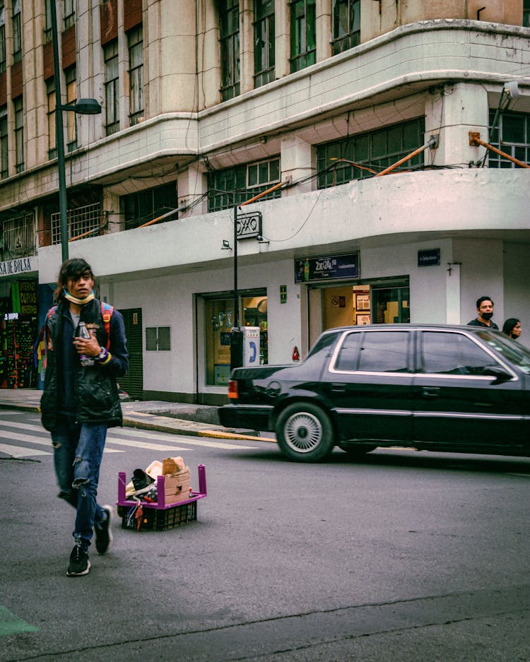 Man And Car On City Street