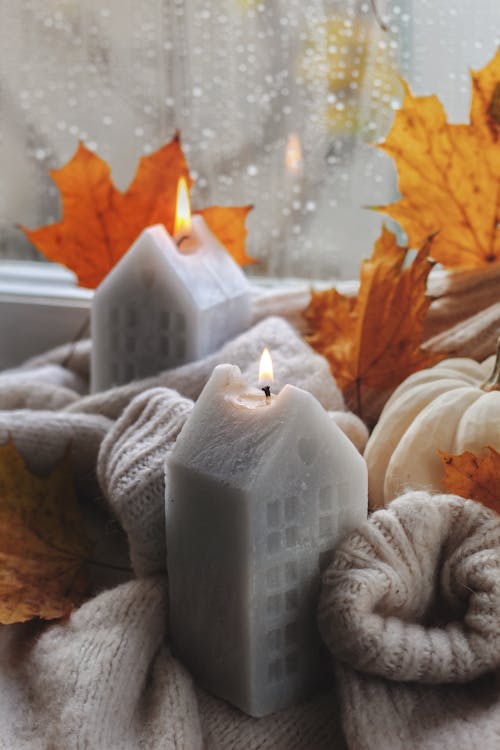 Autumn Windowsill Decoration with Candles and Pumpkin