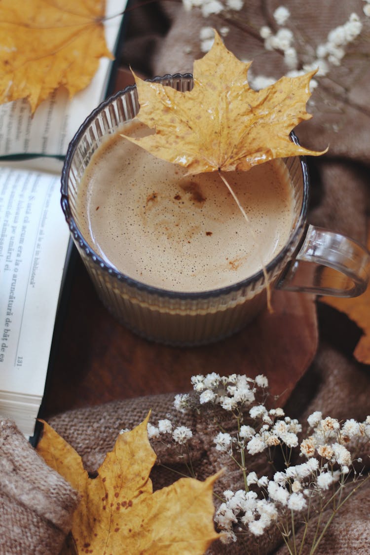 Close Up Of A Coffee With A Leaf