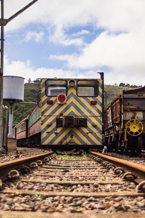 Free A vintage train at Inchanga Station, South Africa, showing intricate railway details. Stock Photo