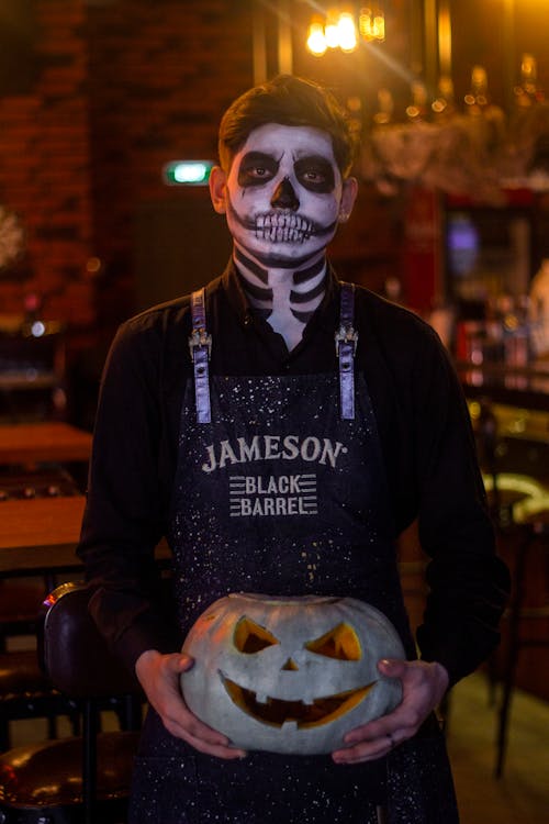 Photo of a Bartender Wearing a Costume 