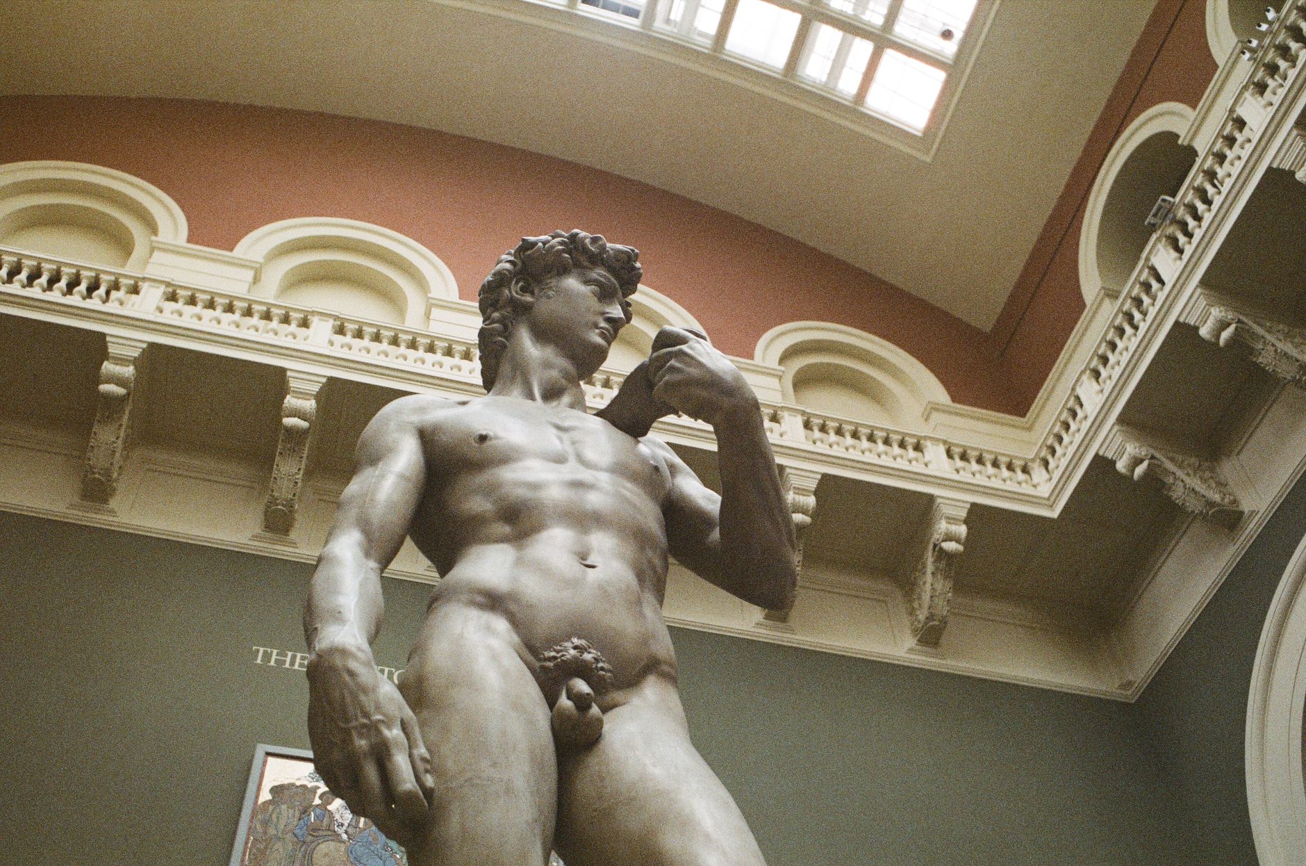 A striking view of Michelangelo's David replica in a London museum.