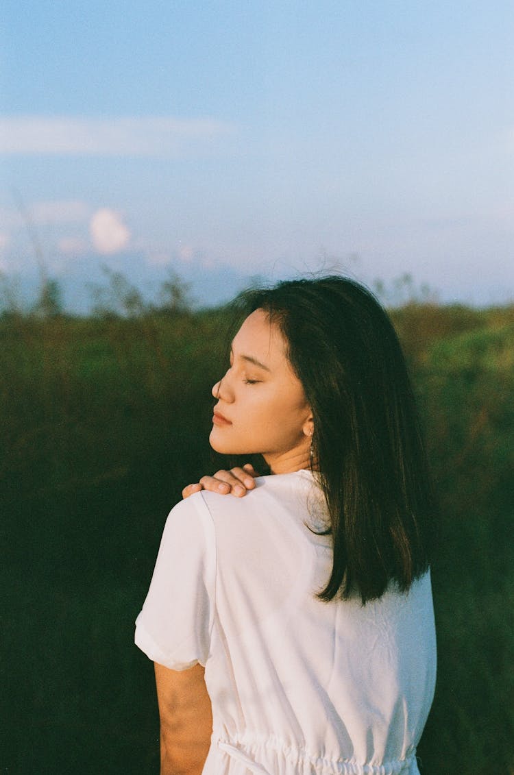 Woman Looking Over Shoulder