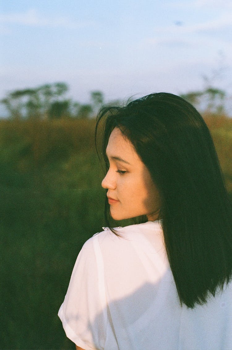 Woman Looking Over Shoulder