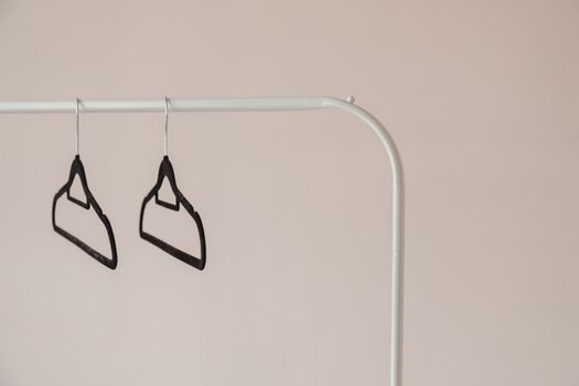 Black Clothes Hanger on White Wall