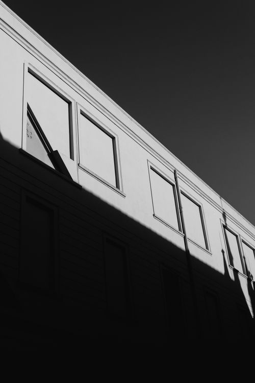 Free Black and white photo of building exterior with dramatic shadows in Buenos Aires. Stock Photo