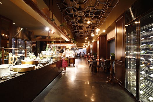 Sophisticated restaurant setting in Ho Chi Minh City with modern lighting and decor.