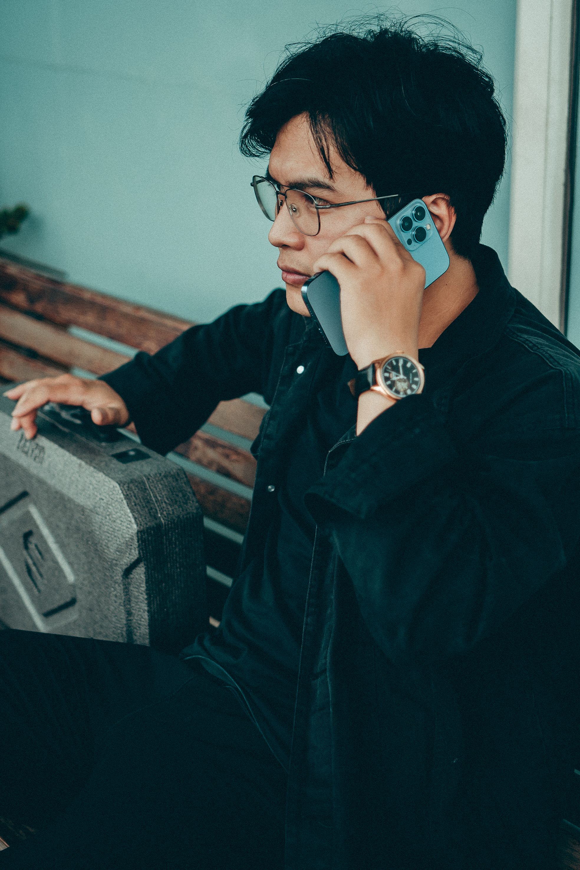 A Man in Black Jacket on a Phone Call