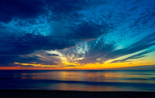 akşam, akşam karanlığı, deniz içeren Ücretsiz stok fotoğraf