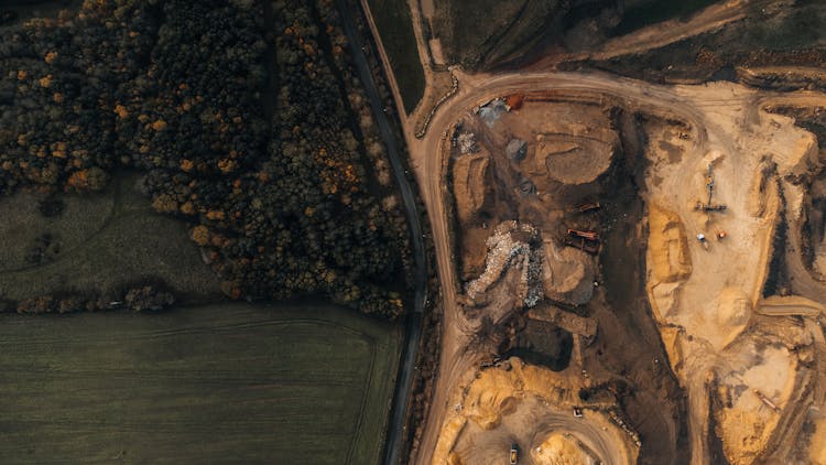 Landfill And Aggregates Mine Located Close To Farmland And Forest 