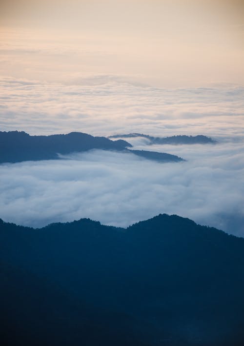 Aerial Photography of Cloudy Mountains