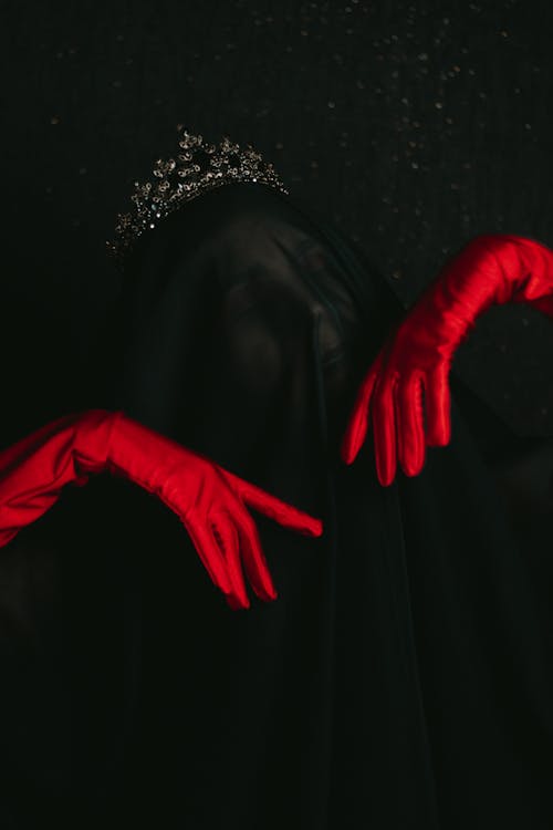 Mysterious, Scary Woman Wearing Veil and Red Gloves