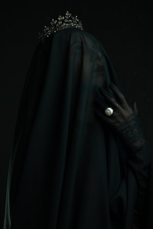 Mysterious, Scary Woman Wearing Veil and Ring