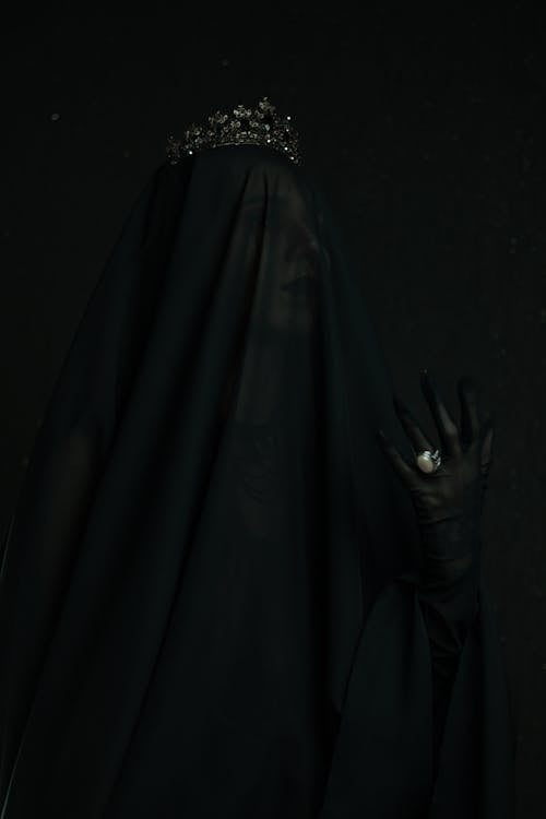 A Woman in Black Veil