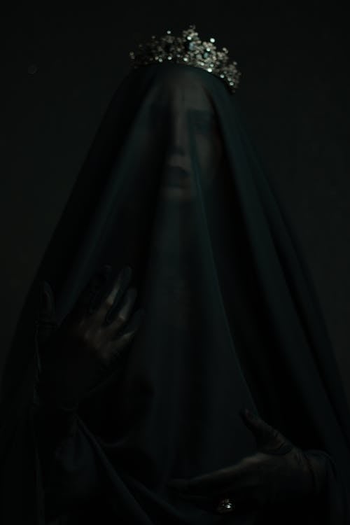 A Person in Black Veil