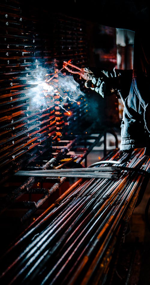 A Person Welding Iron