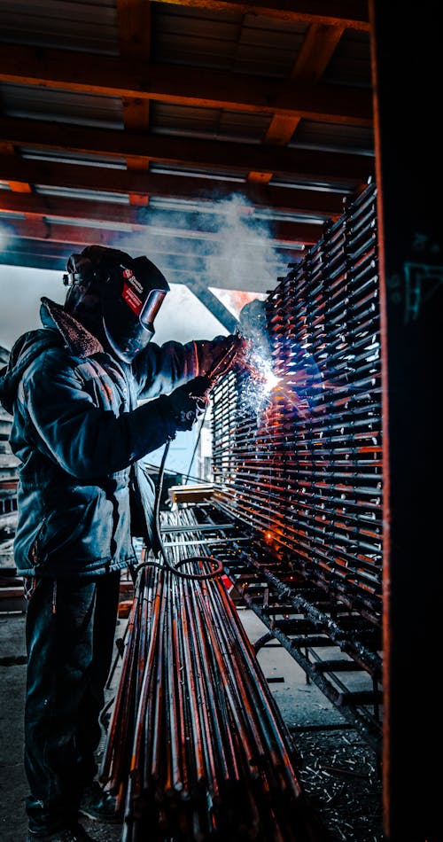 A Person  Welding a Metalwork