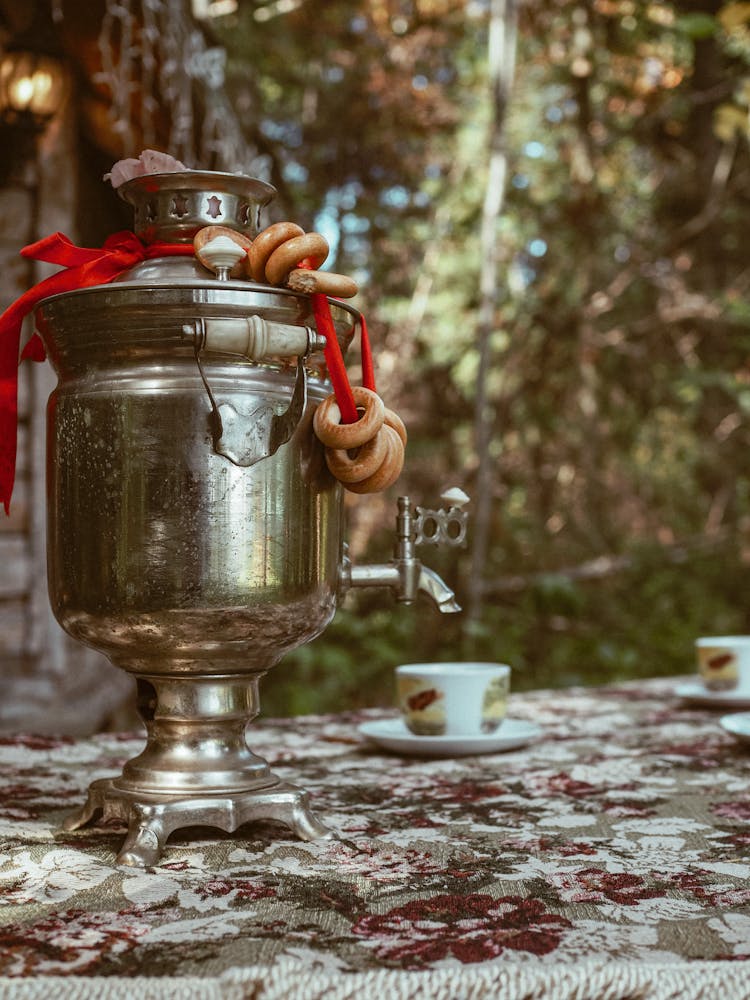 Metal Samovar On Table