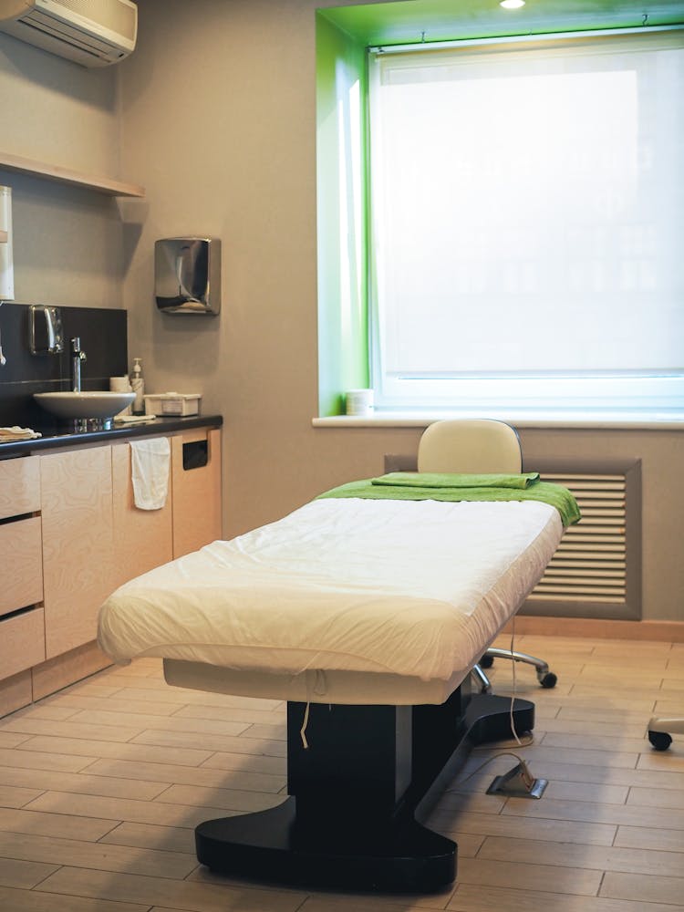 A Hospital Bed Near The Window