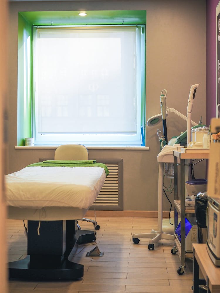 A Hospital Bed Near The Window