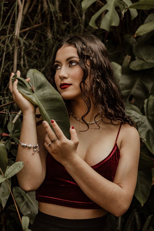 Beautiful Woman Touching Leaf