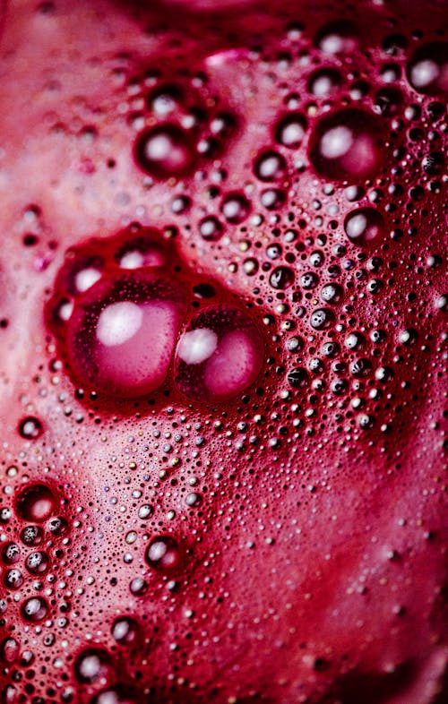 Close-Up Shot of Air Bubbles of Red Liquid