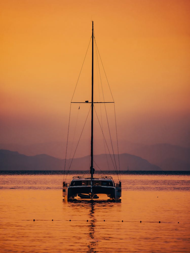 Catamaran On Sea At Dawn