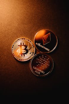Close-up of Bitcoin, Ethereum, and Cardano coins arranged on a metallic copper background.