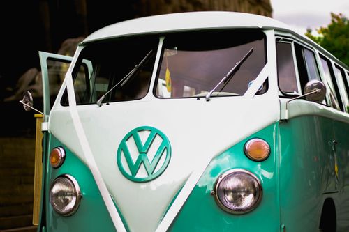 Free Close-up of a classic Volkswagen combi van with a vintage design in an outdoor scene. Stock Photo