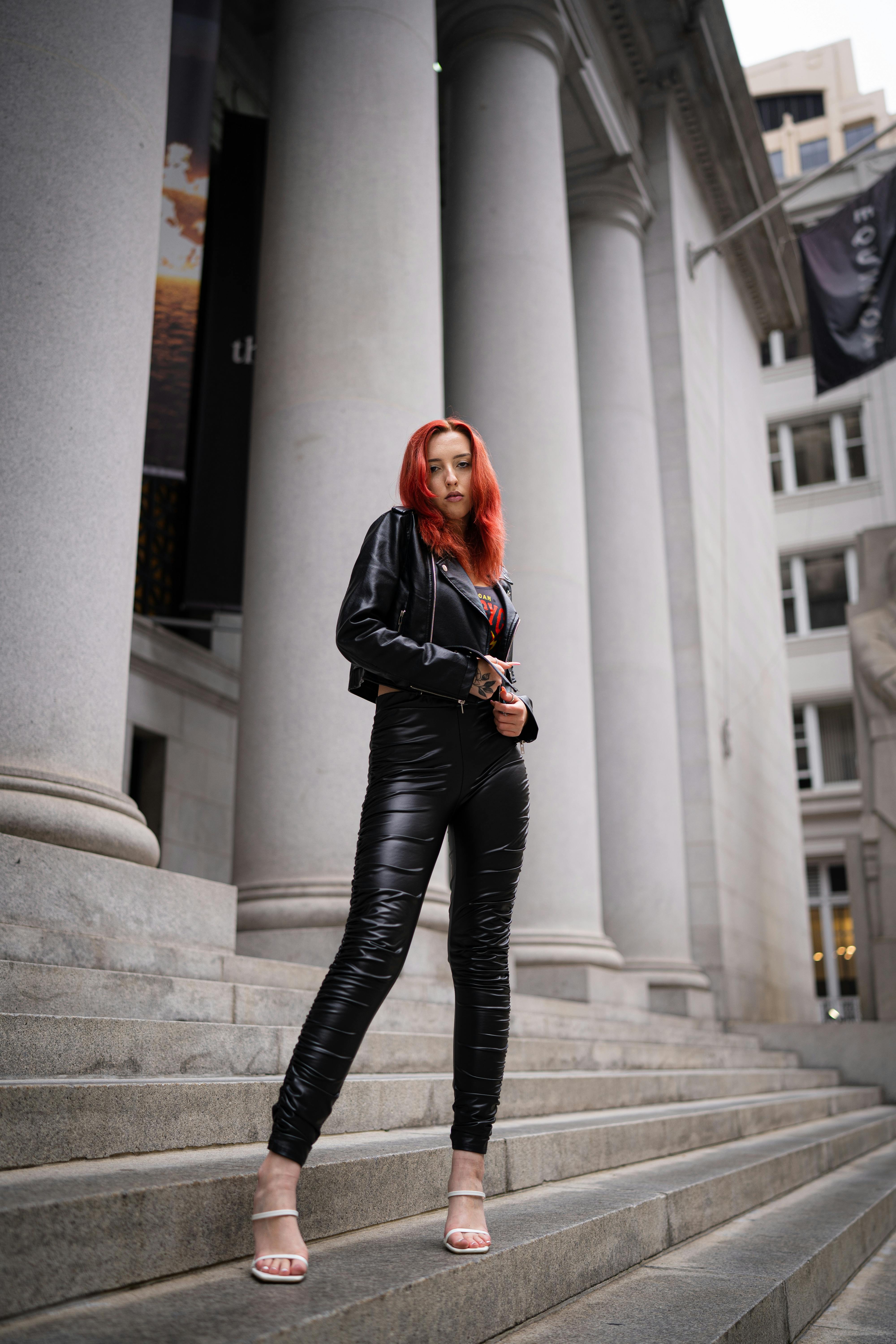 Beautiful, Redhead Woman Wearing Leather on City Street · Free Stock Photo