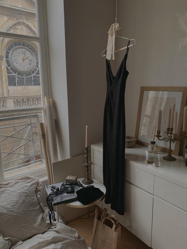 Dress On Coat Hanger In Bedroom