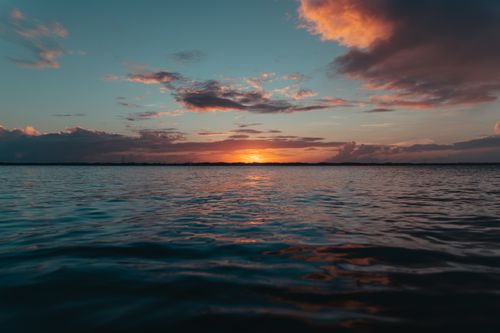 Free Beautiful sunset view over the calm sea in Central Eleuthera, The Bahamas. Stock Photo