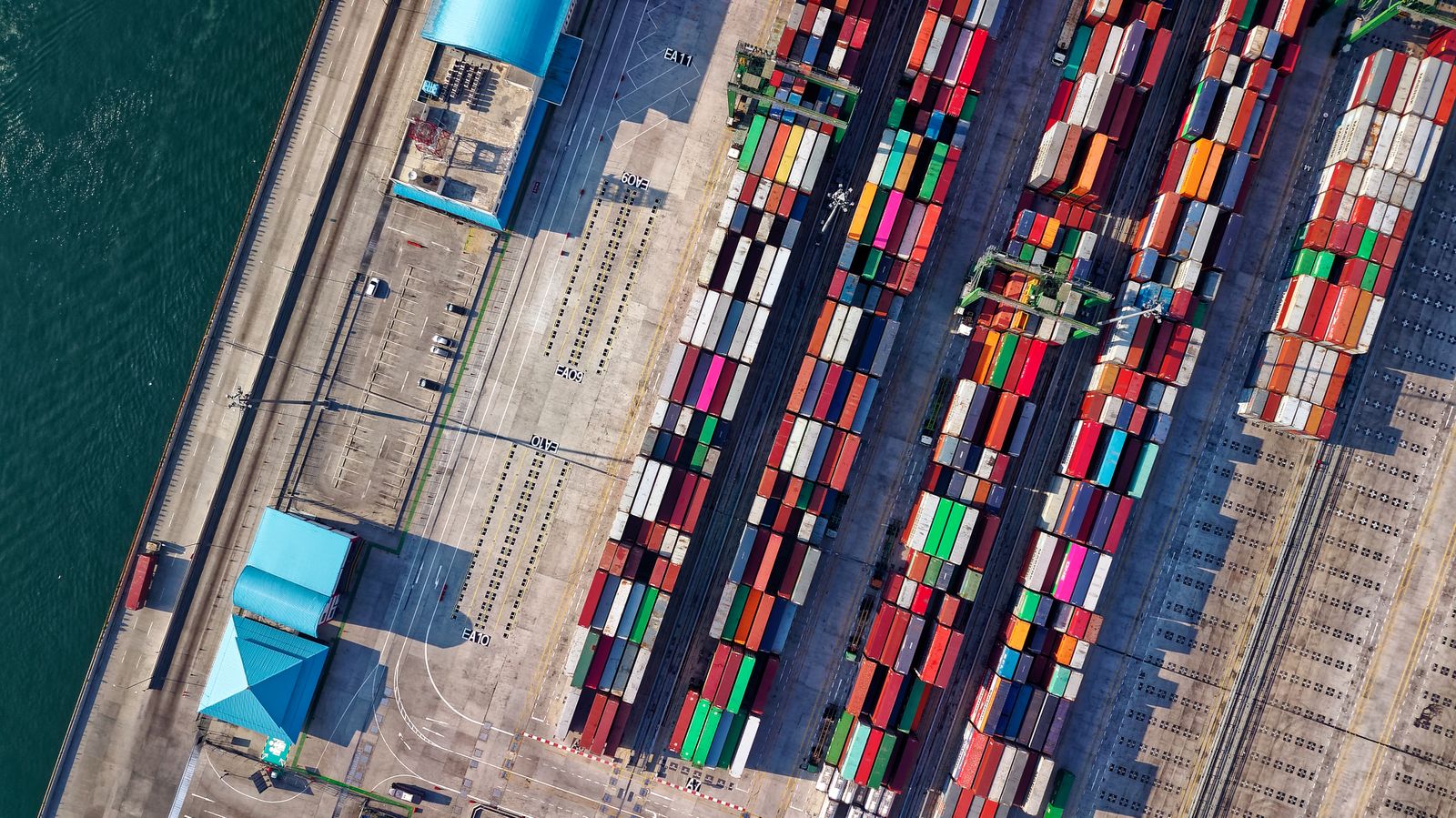 Aerial view of colorful cargo shipping containers at a port