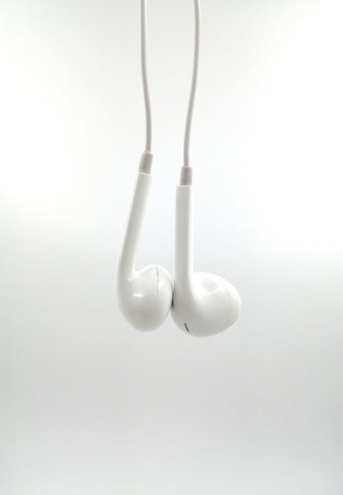 White Earphones in Close Up Shot