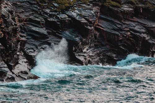 Body Of Water Near Rocks