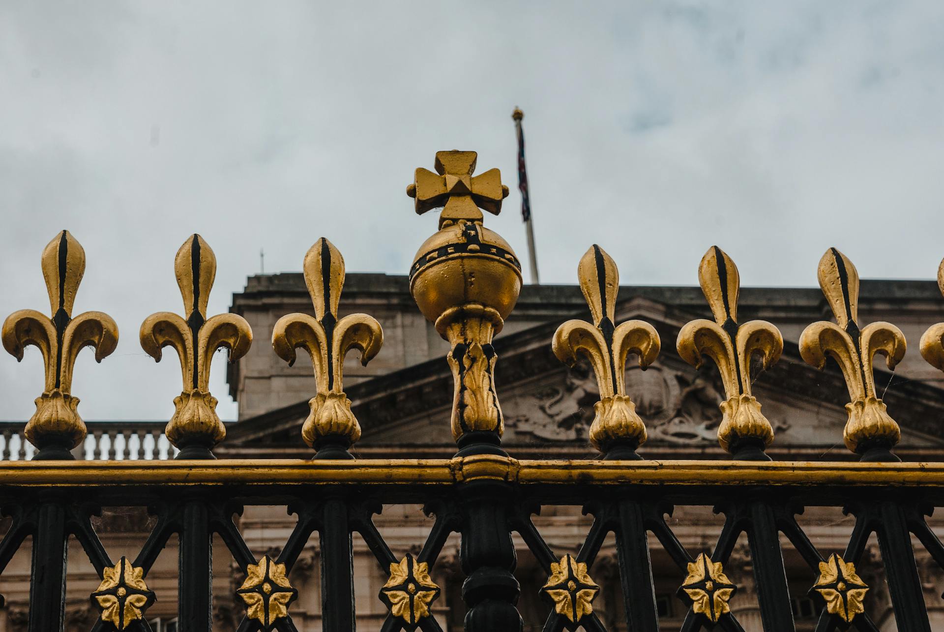 Close-up of a golden decorative fence at a famous London landmark in the UK.