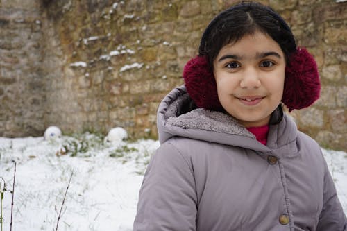 Close Up Photo of a Girl Wearing Jacket