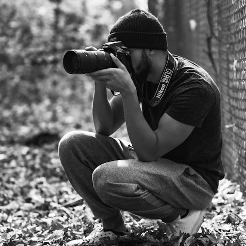 Grayscale Photo of a Photographer