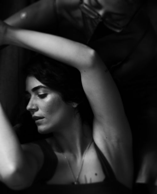 Free Artistic black and white portrait of a woman striking a graceful pose in São Paulo. Stock Photo